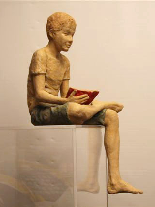 Child with the little red book ceramic 57x30x26